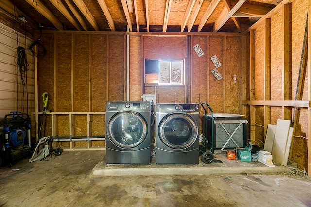 laundry room with washer and dryer