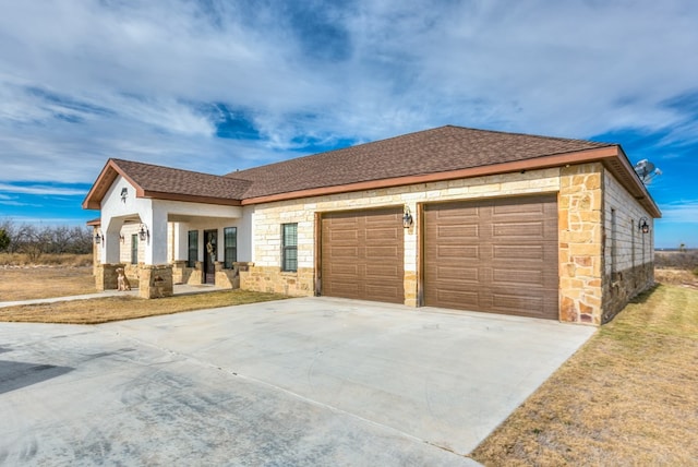 view of front of house with a garage