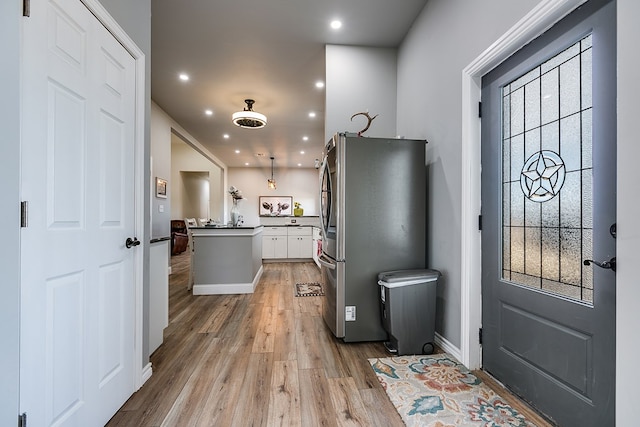 interior space with light hardwood / wood-style flooring