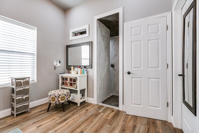 sitting room with light hardwood / wood-style flooring