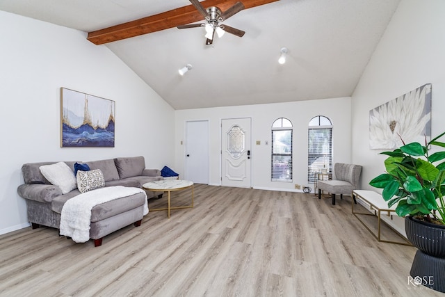 living room featuring high vaulted ceiling, beam ceiling, light hardwood / wood-style floors, and ceiling fan