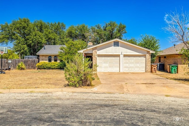 single story home featuring a garage