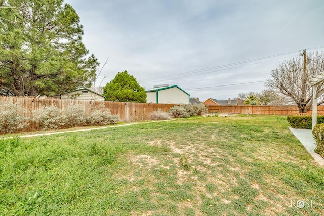 view of yard featuring fence