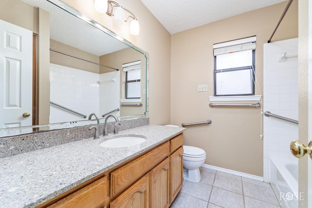 bathroom with baseboards, toilet, tile patterned floors, a textured ceiling, and vanity