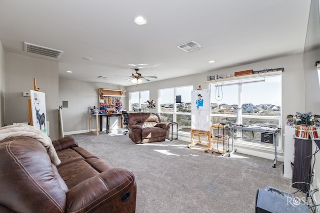 living room with carpet and ceiling fan