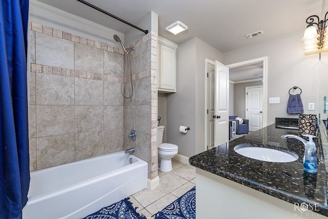 full bathroom with vanity, toilet, tile patterned flooring, and shower / bath combo with shower curtain