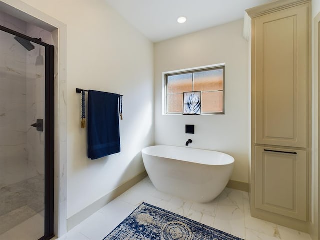 3608 Clearview Dr, San Angelo, TX 76904 - full bathroom featuring a marble finish shower, a freestanding tub, and marble finish floors
