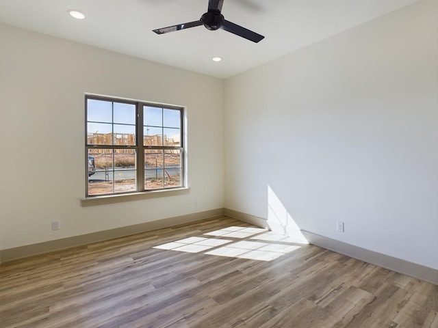 3608 Clearview Dr, San Angelo, TX 76904 - spare room featuring ceiling fan, wood finished floors, and recessed lighting