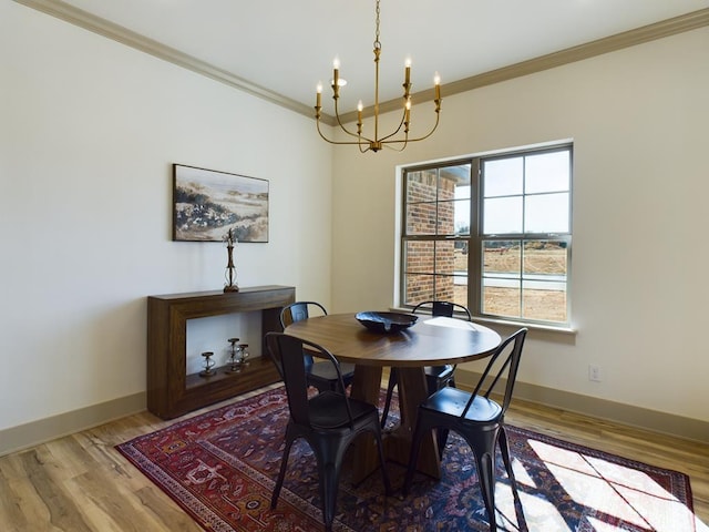 3608 Clearview Dr, San Angelo, TX 76904 - dining area with a chandelier, ornamental molding, and wood finished floors