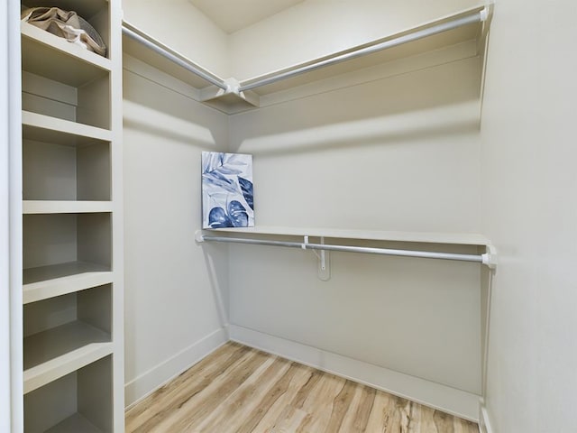 3608 Clearview Dr, San Angelo, TX 76904 - walk in closet with wood finished floors