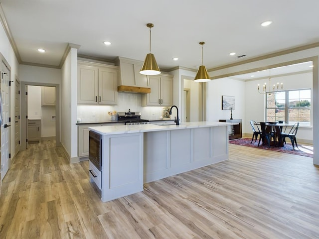 3608 Clearview Dr, San Angelo, TX 76904 - kitchen featuring stainless steel range oven, ornamental molding, a chandelier, light wood-type flooring, and tasteful backsplash