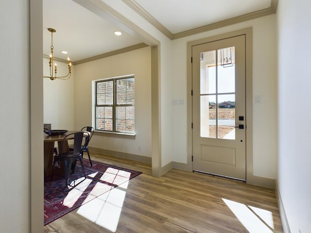 3608 Clearview Dr, San Angelo, TX 76904 - doorway featuring ornamental molding, wood finished floors, a chandelier, an office area, and recessed lighting