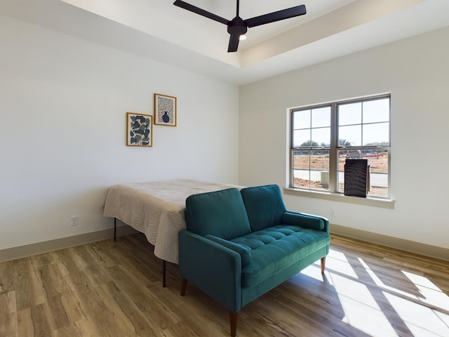 3608 Clearview Dr, San Angelo, TX 76904 - bedroom featuring wood finished floors, a raised ceiling, and ceiling fan