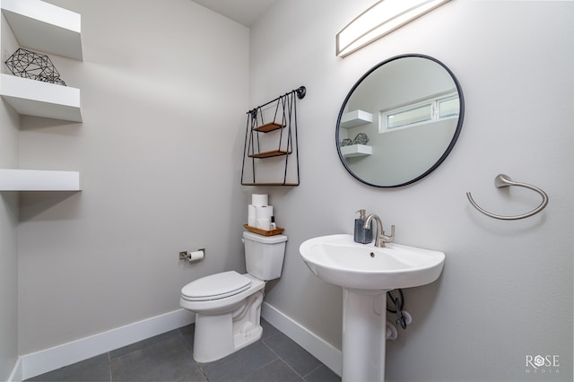 4992 Silver Creek Pass, San Angelo, TX 76904 - half bathroom with tile patterned floors