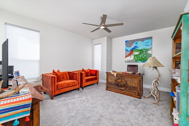 4992 Silver Creek Pass, San Angelo, TX 76904 - carpeted living area featuring a ceiling fan
