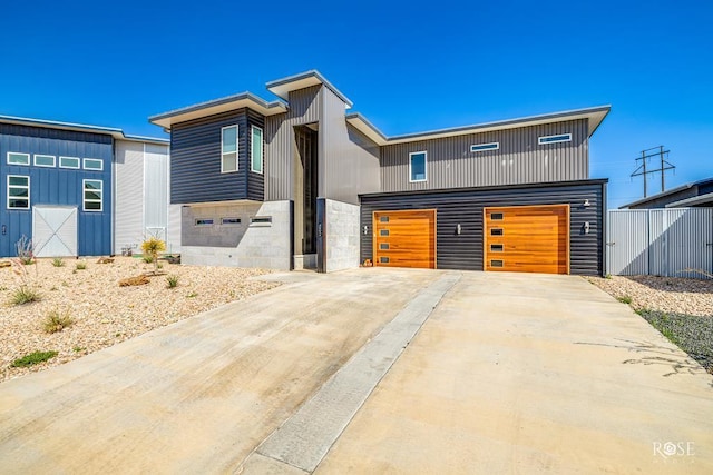 4992 Silver Creek Pass, San Angelo, TX 76904 - contemporary home featuring a garage and concrete driveway