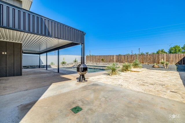 4992 Silver Creek Pass, San Angelo, TX 76904 - fenced backyard featuring a patio area