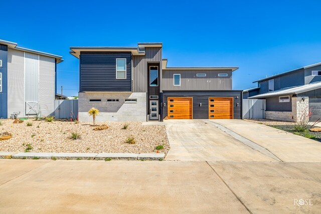 4992 Silver Creek Pass, San Angelo, TX 76904 - contemporary house featuring a garage and concrete driveway