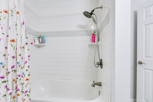 bathroom featuring shower / tub combo with curtain