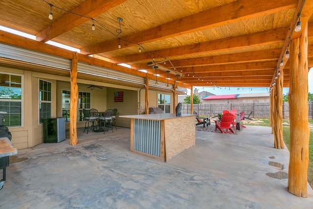 7805 Elk Run, San Angelo, TX 76901 - view of patio / terrace with fence, a ceiling fan, and outdoor dining area