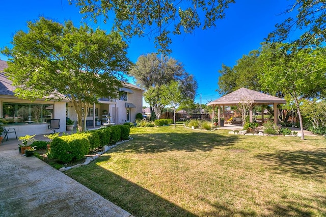 5202 Beverly Dr, San Angelo, TX 76904 - view of green lawn featuring a gazebo and a patio