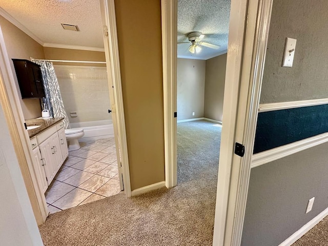 5202 Beverly Dr, San Angelo, TX 76904 - bathroom featuring a textured ceiling, crown molding, a ceiling fan, vanity, and toilet