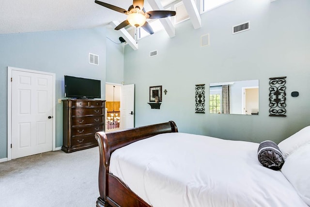 5202 Beverly Dr, San Angelo, TX 76904 - bedroom featuring high vaulted ceiling, carpet, baseboards, a ceiling fan, and beamed ceiling