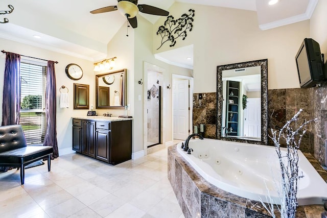 5202 Beverly Dr, San Angelo, TX 76904 - full bath featuring ornamental molding, a whirlpool tub, a ceiling fan, lofted ceiling, and vanity