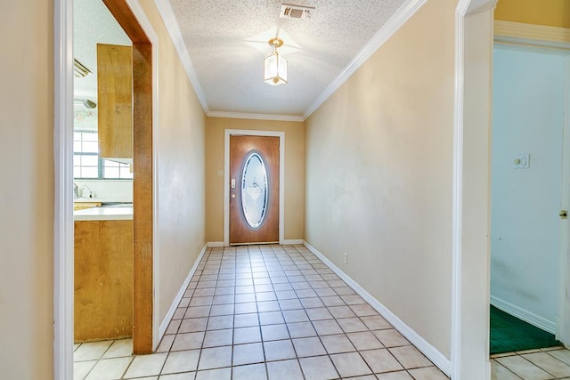  - doorway to outside featuring crown molding, a textured ceiling, and light tile patterned floors