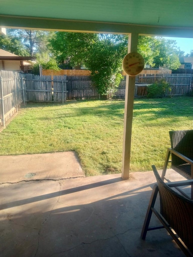 3317 Rockbrook Dr, San Angelo, TX 76904 - fenced backyard with a patio