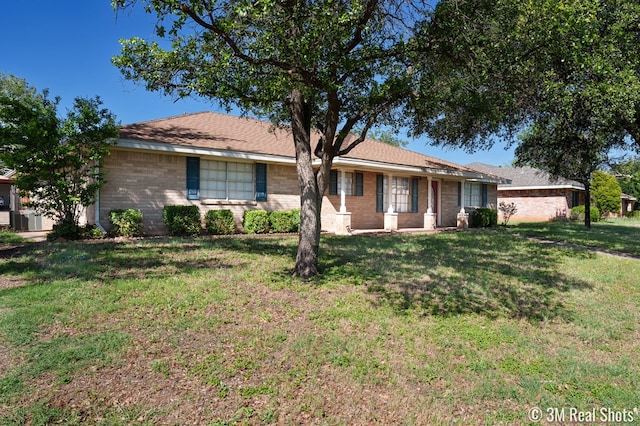 3317 Rockbrook Dr, San Angelo, TX 76904 - single story home with brick siding and a front lawn