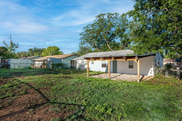 2007 Stanton St, Brady, TX 76825 - back of house with a patio area