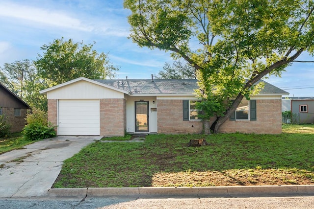 2007 Stanton St, Brady, TX 76825 - single story home featuring brick siding, a garage, and concrete driveway