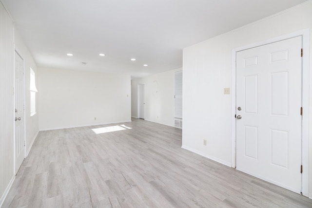 2007 Stanton St, Brady, TX 76825 - unfurnished room featuring recessed lighting, light wood finished floors, and baseboards