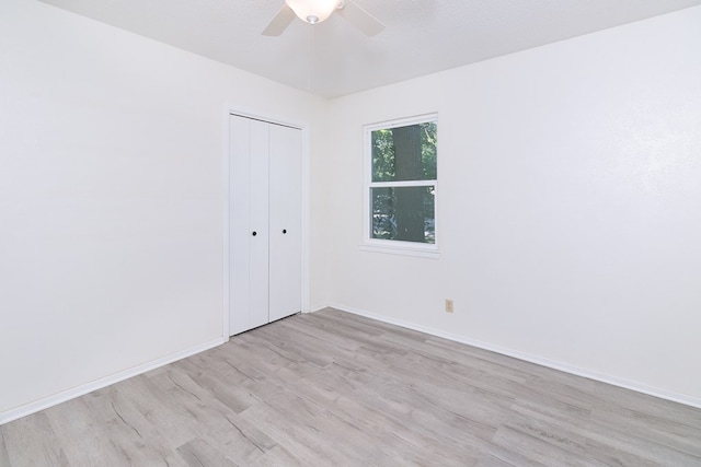 2007 Stanton St, Brady, TX 76825 - spare room with light wood-style floors, a ceiling fan, and baseboards