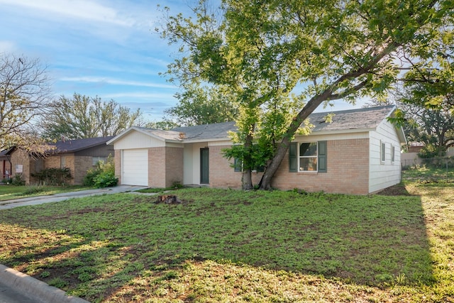 2007 Stanton St, Brady, TX 76825 - single story home featuring brick siding, an attached garage, concrete driveway, and a front lawn