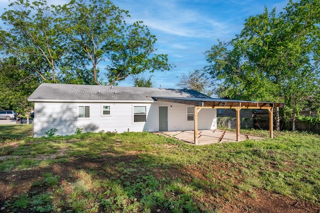 2007 Stanton St, Brady, TX 76825 - back of property featuring a patio area