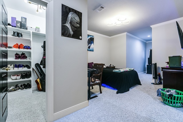 bedroom featuring ornamental molding and carpet flooring