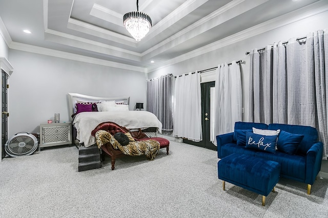 carpeted bedroom featuring a raised ceiling, crown molding, and a notable chandelier