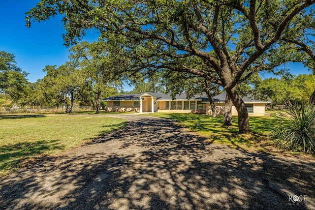 exterior space featuring a front lawn