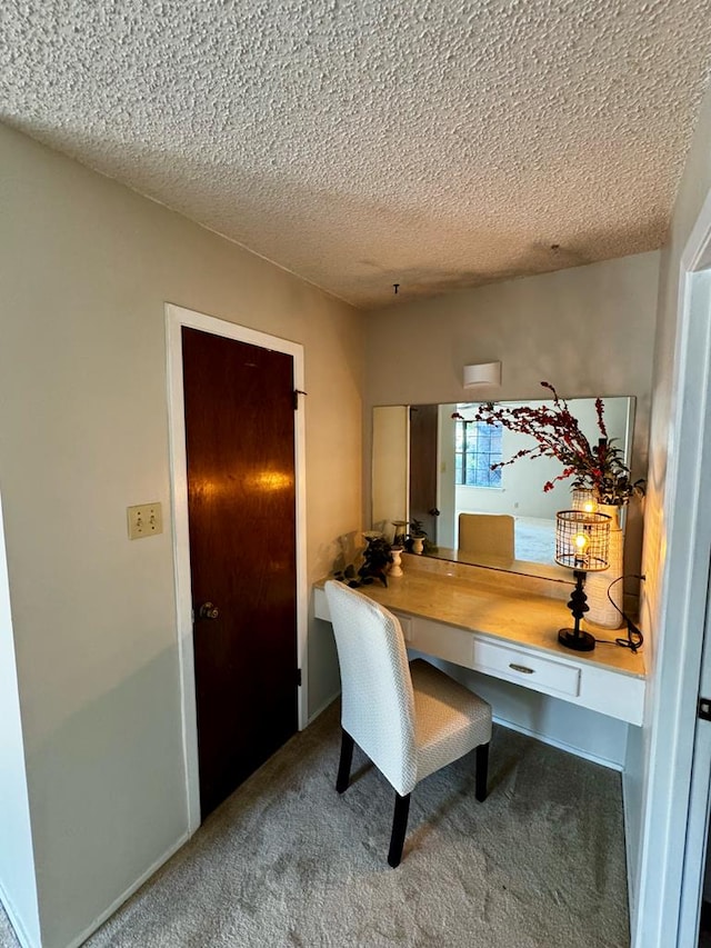 3302 Southland Blvd, San Angelo, TX 76904 - carpeted home office with a textured ceiling