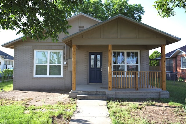 115W 3rd St, San Angelo, TX 76903 - bungalow-style house with brick siding and covered porch