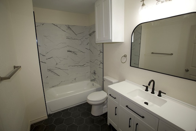 115W 3rd St, San Angelo, TX 76903 - bathroom featuring vanity, toilet,  shower combination, and tile patterned floors