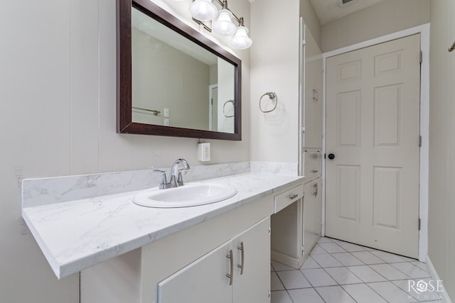 bathroom featuring vanity and tile patterned flooring