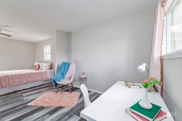 3119 Woodland Cir, San Angelo, TX 76904 - bedroom with baseboards and wood finished floors
