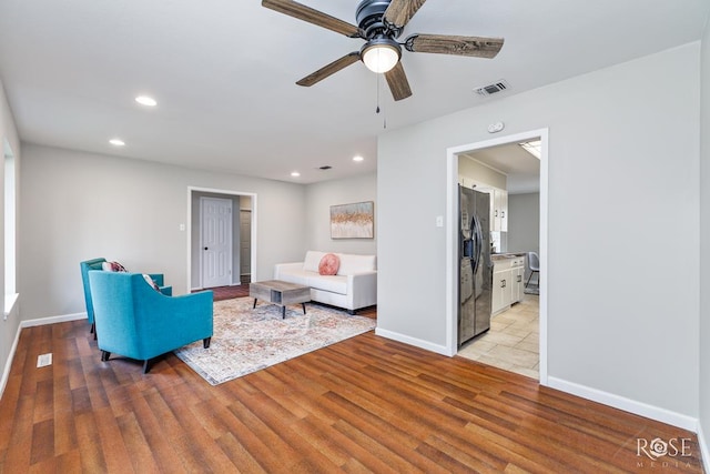3119 Woodland Cir, San Angelo, TX 76904 - living room with visible vents, recessed lighting, baseboards, and light wood-style flooring