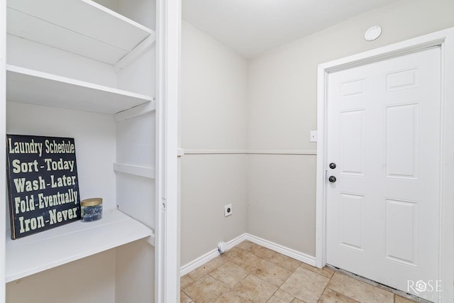 3119 Woodland Cir, San Angelo, TX 76904 - laundry area with baseboards, laundry area, and hookup for an electric dryer