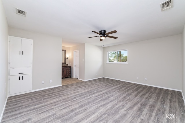 unfurnished room featuring ceiling fan and light hardwood / wood-style flooring