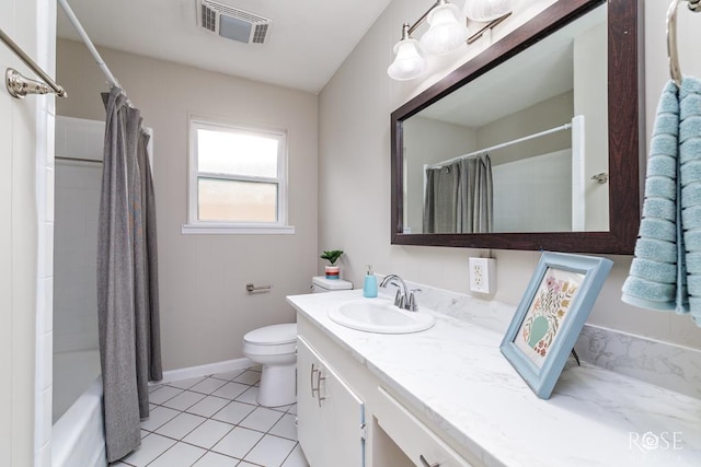 3119 Woodland Cir, San Angelo, TX 76904 - bathroom featuring visible vents, tile patterned flooring, vanity, toilet, and baseboards