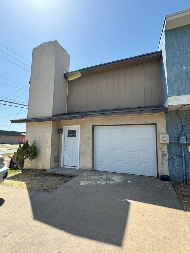 view of front of property featuring a garage